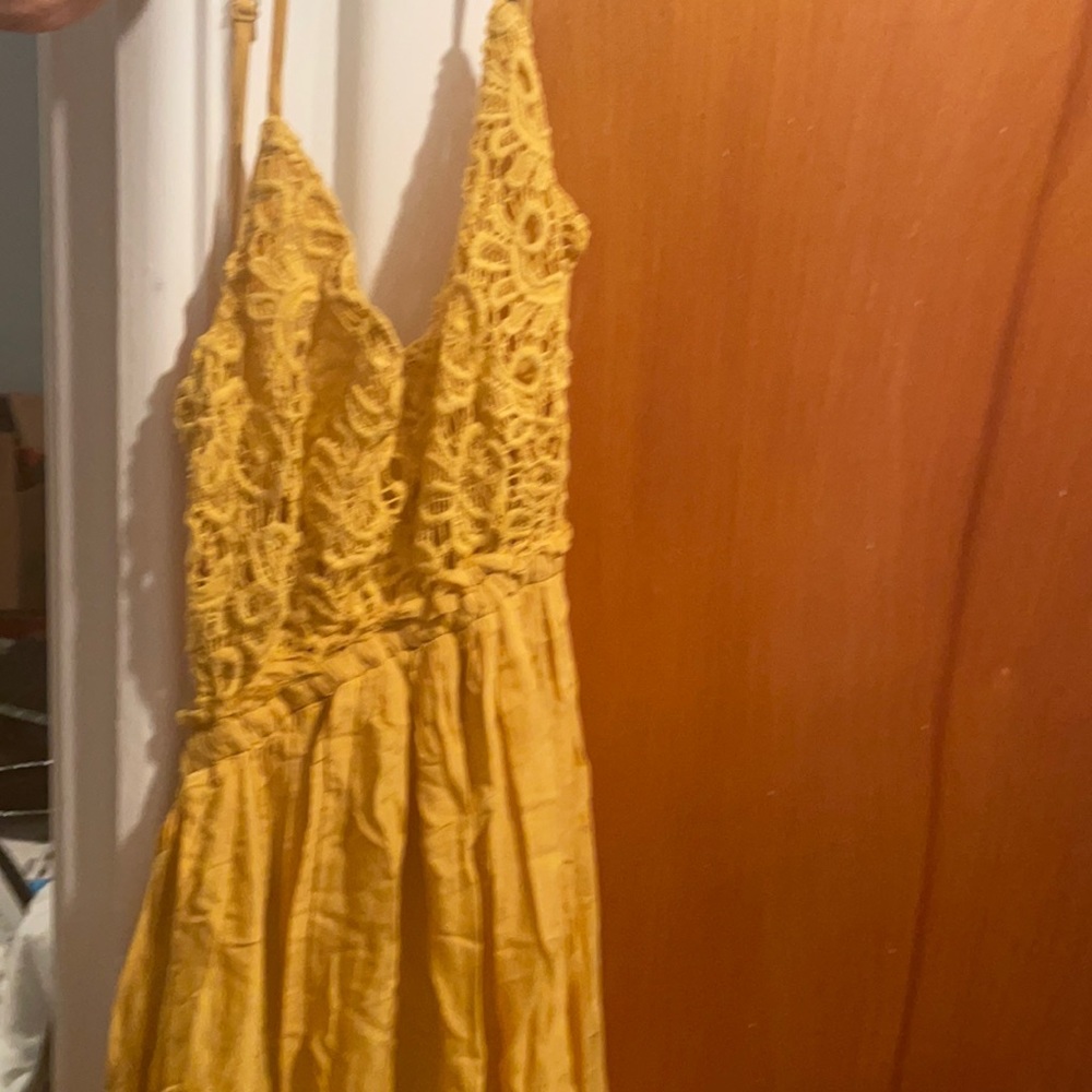 Cute yellow backless fashion nova dress.